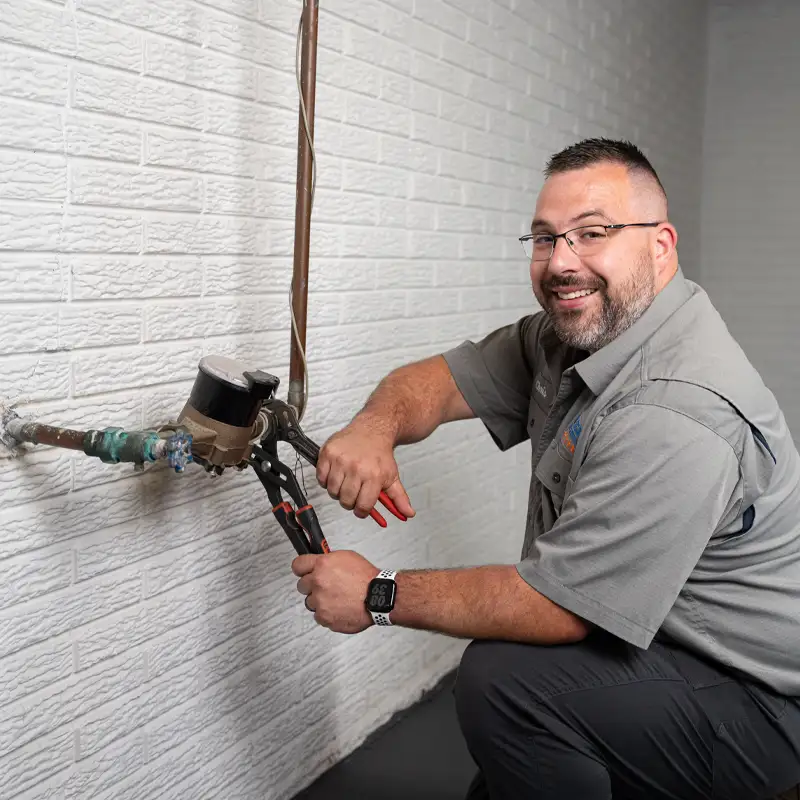 Plumber working on a gas line