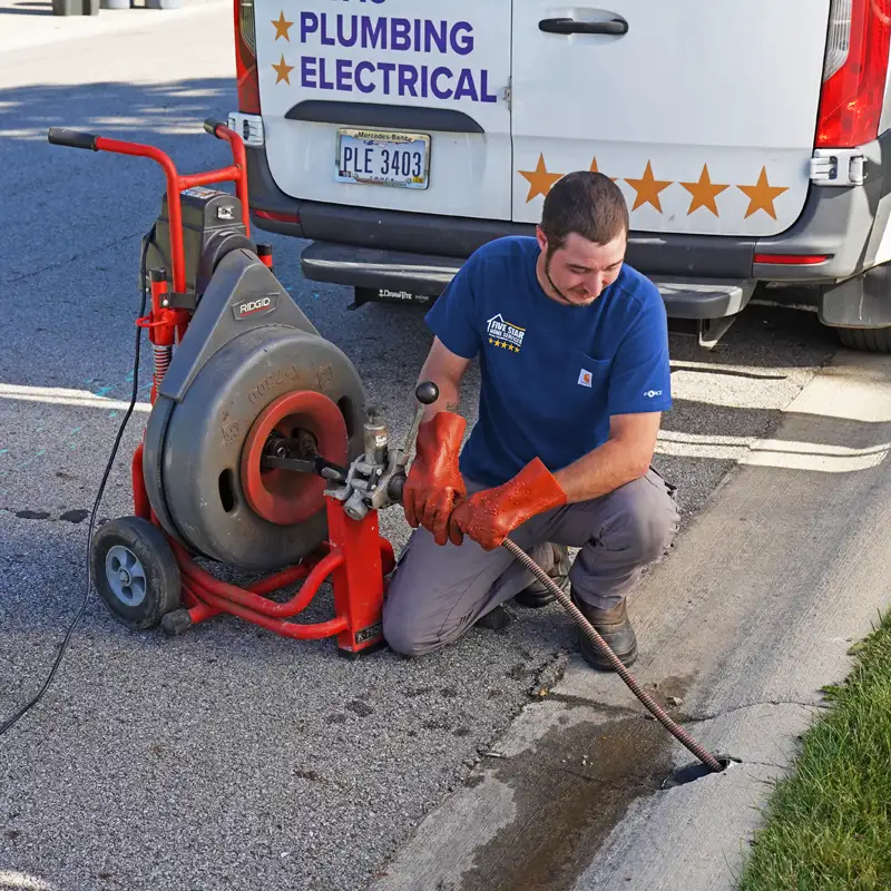 Plumber fixing a sewer line